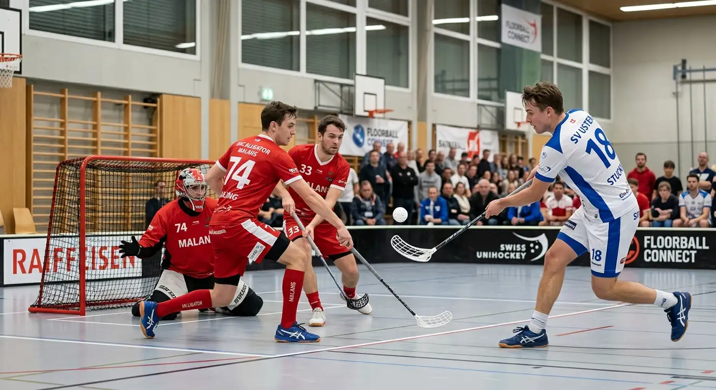 Hochtempo-Szene im Unihockey mit Schuss aufs Tor und Verteidigern davor