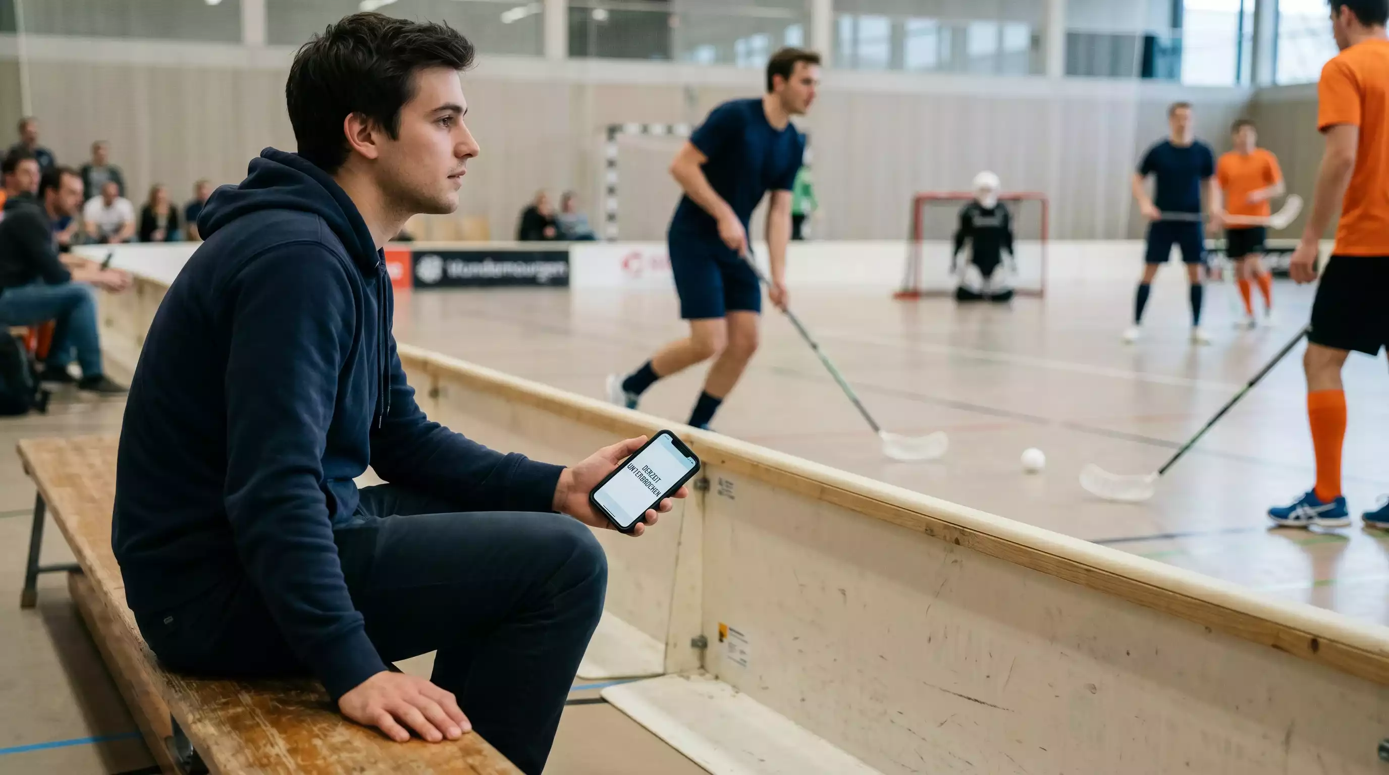 Eingefrorene Live-Wette auf einem Smartphone-Bildschirm während einer Suspension im Floorball